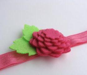 Little girl elastic headband with hot pink felt flower 