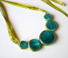 Statement necklace in shades of turquoise, jade and green