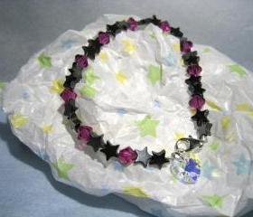 Luckystars Bracelet w/hematite starts and fushia 6mm Swarovski beads and a dangling Swarovski Heart