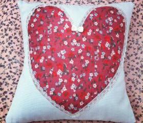 Red ditzy floral heart cushion.