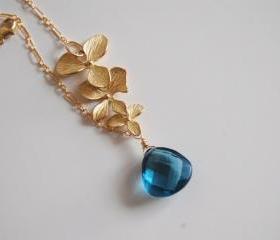 London blue quartz and Orchid charm Necklace with Gold filled chain.