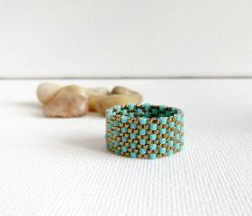 Turquoise bronze textured custom band ring.