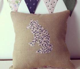Appliqued, handmade, floral fox cushion on hessian background