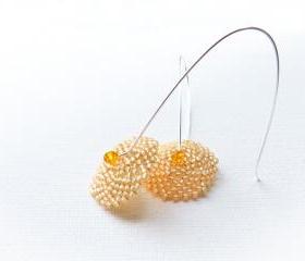 Bridesmade Apricot round shape long dangle beadwoven earrings. Pastel color fashion jewelry