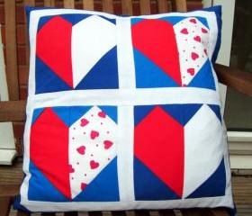 Red white and blue hearts cushion