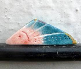 Ceramic Brooch / Triangular Fish Figure In Light Red & Petrol Blue
