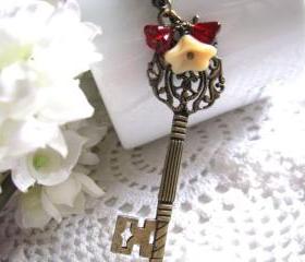 Key To My Heart Necklace - Antiqued Bronze Large Long Skeleton Key, Ruby Siam and Matte Opaque Beige Czech Flower, Woodland Insp