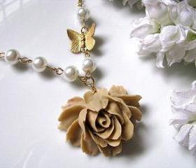 Latte Rose and Butterfly Necklace - Rose Cabochon, Raw Brass Butterfly And White Glass Pearls