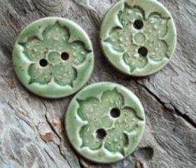 Beautiful mint green speckled buttons