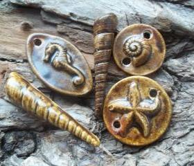 Seashell ,starfish ,seahorse and sand dollar pendants links cab