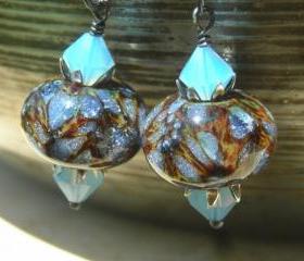 Oxidized sterling silver earrings lampwork beads Periwinkle butterflies on leopard beads air blue opal and antiqued silver petals