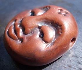 Handmade polymer clay smiling face focal bead pendant, antique copper blue patina, primitive art, handmade jewelry supplies, metallic