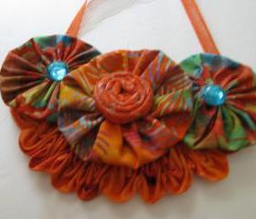 Orange Yo Yo Bib Necklace