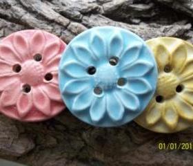 Handmade pink stoneware clay flower button