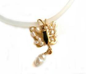 Whimsical Necklace gold butterfly pendant wire wrapped pearls clear rubber necklace Mother's Day Gift for mom under 20