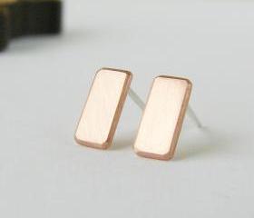 Geometric earrings . Small copper studs