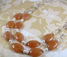 PEACH FANTASY peach jade gemstone ovals and freshwater pearls with handworked sterling silver leaves