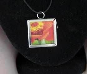 Orange Flower Pendant on Black Cord