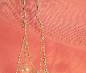 Glass pearl earrings on silver plated wire hung on silver plated earwire