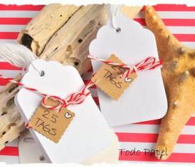 25 White tags with string. Scalloped edge.