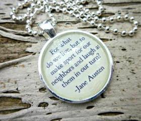 Jane Austin. Pride & Prejudice. Round silver bezel and glass ball chain necklace. For what do we live, but to make sport for our neighbors and laugh at them in our turn. Glass Dome. Metal bezel. Ball chain.