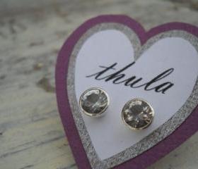 white topaz studs earrings