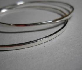 bangles polished silver bangles x 2