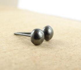 Small silver studs . Black oxidized sterling silver pebbles