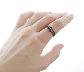 Silver pebble stacking rings . Black oxidized . Set of three