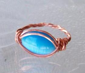 Ring sz 7.5 - Wire Wrapped Twisted Copper with Blue Fiber Optic Stone