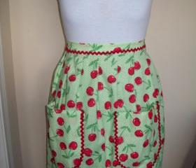Handmade Bright Cherry Pattern Half Apron with green lining and red rick rack accents