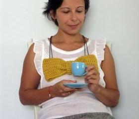 Enormous bow crochet necklace. Burnt yellow yarn.