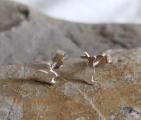 Silver Rabbit earrings: A pair of Bunny shaped sterling silver earrings.