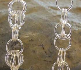 Silver Byzantine earrings: A pair of sterling silver byzantine chain maile earrings with each link soldered.