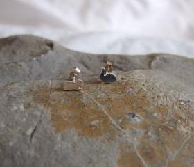 Silver Rabbit earrings: A pair of Bunny shaped sterling silver earrings.