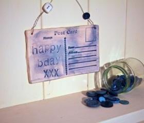 Ceramic Birthday Postcard. Lightly glazed in blue. Handmade made in Wales, UK