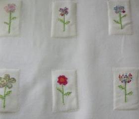 baby girls baby blanket with flowers in cream