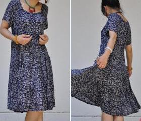 Cotton pumping with waist broken pleated short sleeve swing dress 