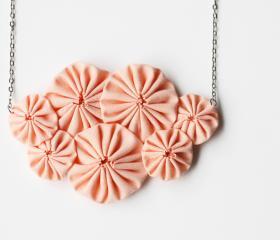 Peach yoyo necklace
