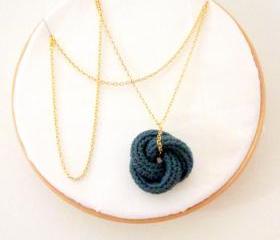 Etarnally. Crochet knot pendant in cypress green