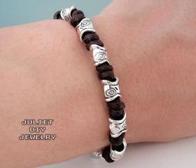 Tribal style silver fish bead hemp bracelet