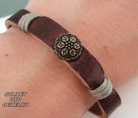 Simple leather bracelet with brass flower button