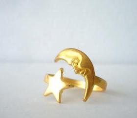  brass moon ring with a star. wrap style open ring