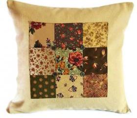 Vintage style patchwork panel cushion cover with button detail in rich warm rusts and greens 35cm