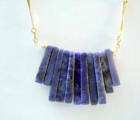 Dark blue stone necklace in tribal style with gold filled chain