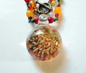 blown glass pendant necklace with beaded chain, flame flower