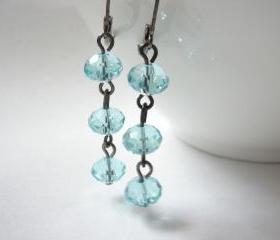 Cool lake blue crystal and black gunmetal earrings