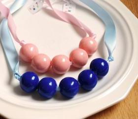 1 Gum ball necklace (edible) 