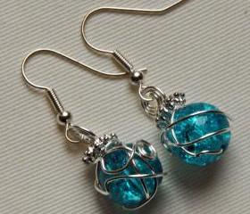 Silver earrings with wire wrapped blue glass crackle beads and looped top, to match handfasting cord