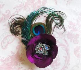 Magenta silk peacock feather corsage.